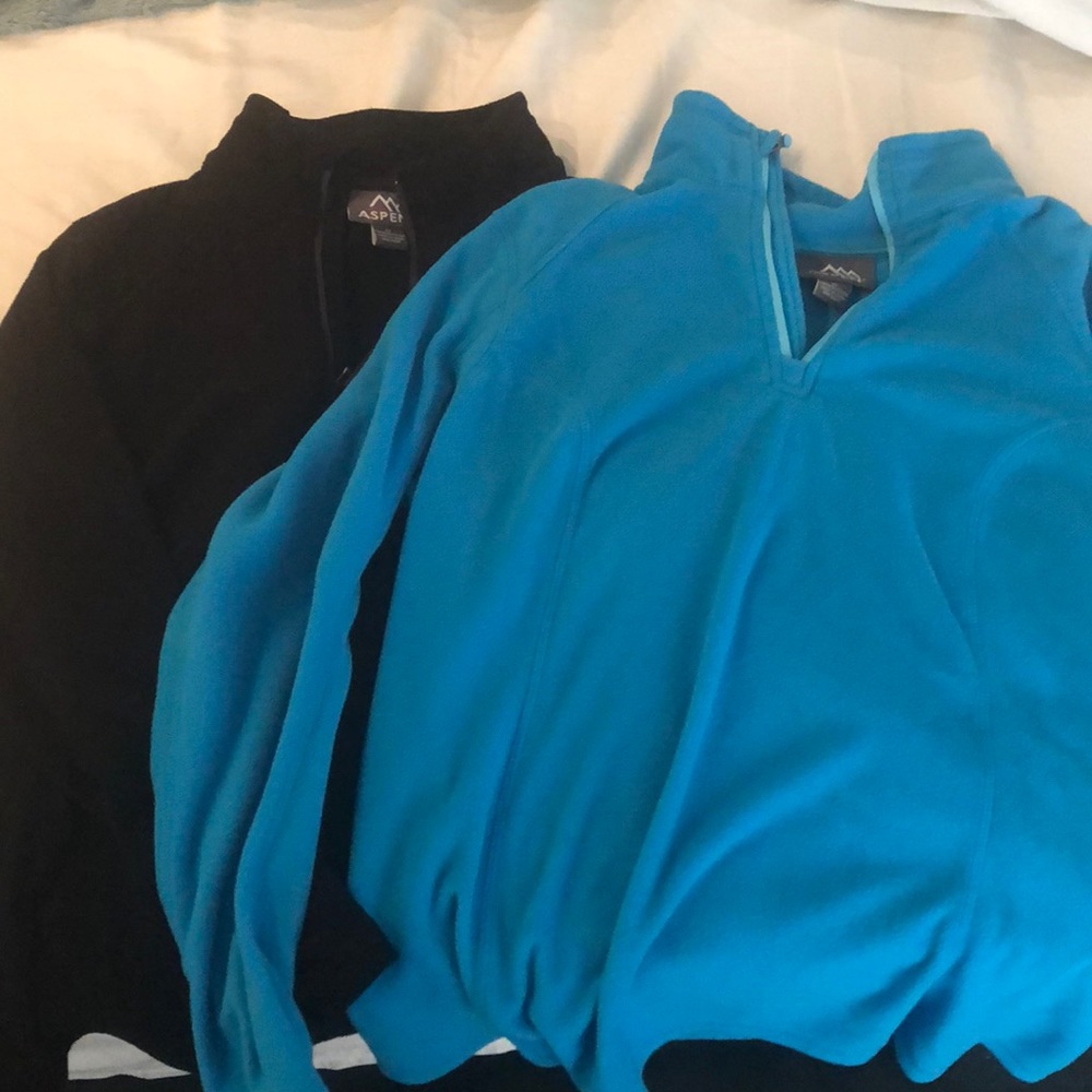 Black in teal pullovers in a Large